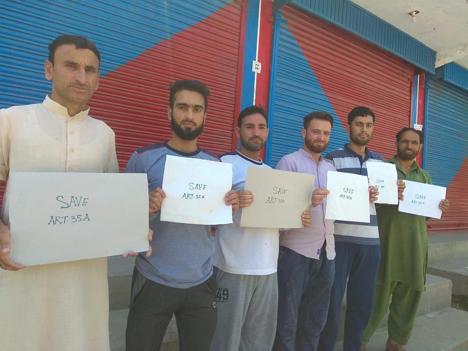 Batagund traders protest against tinkering with Article 35-A